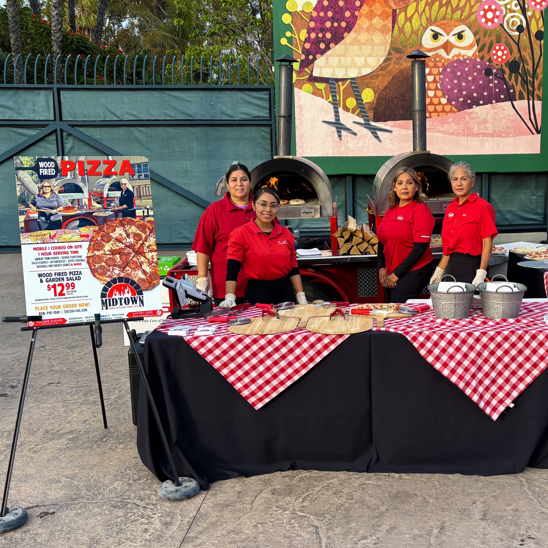 MidTown wood fired pizza catering setup with crew at an outdoor event